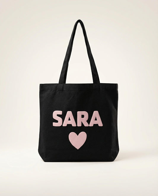 Personalized black cotton tote bag with puff vinyl name in UAE
