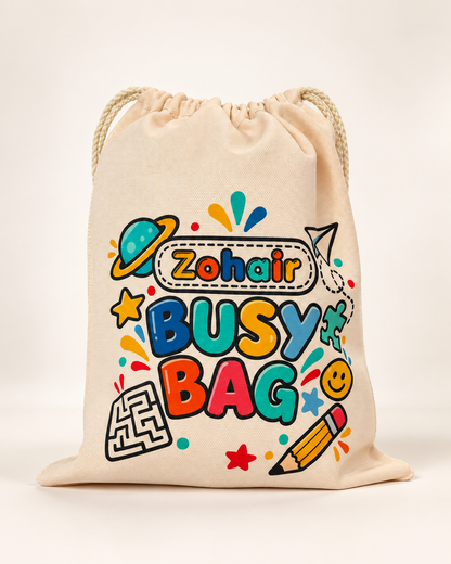 Personalized drawstring Busy Bag for kids with custom child name and colorful educational design